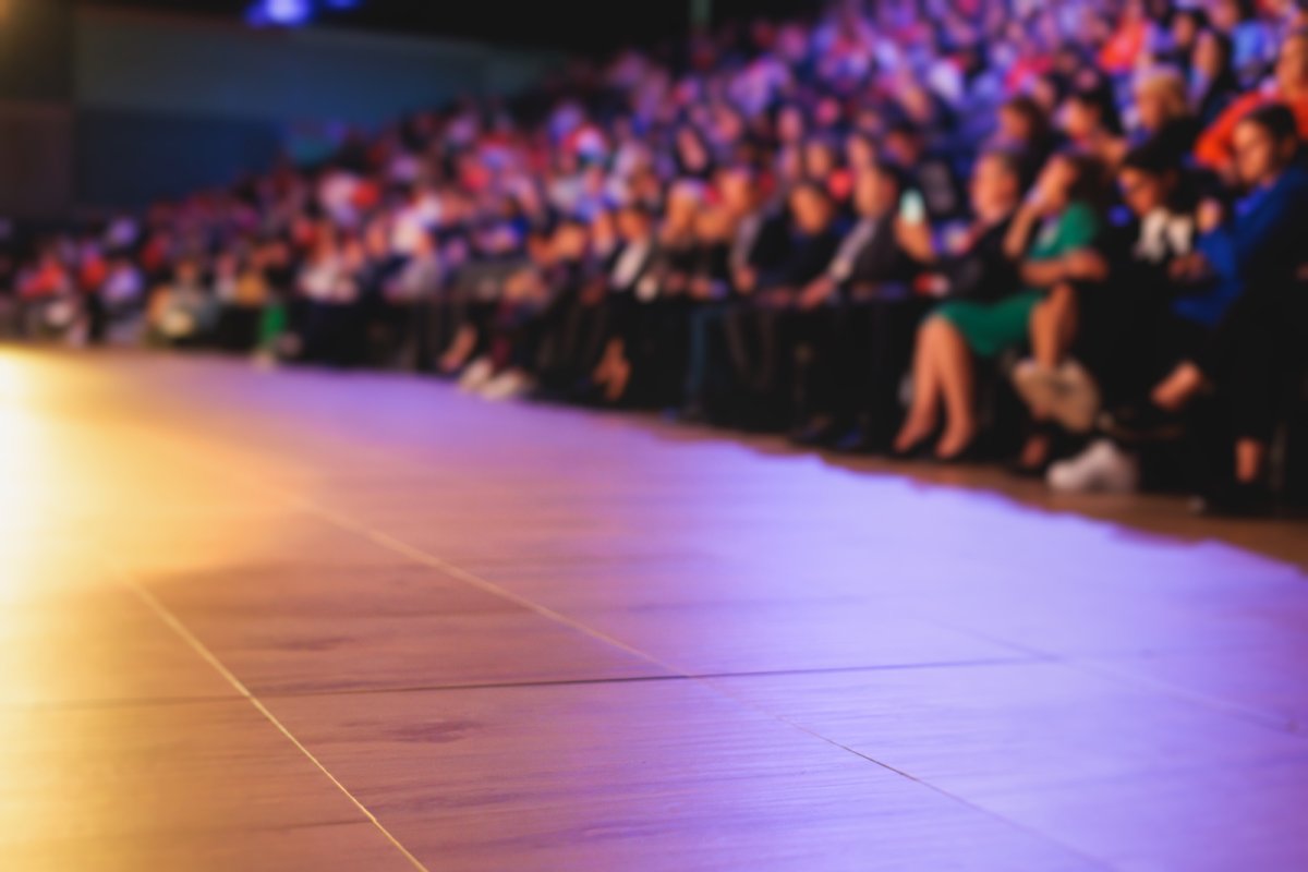 Audience at conference hall. Credit: Nikolay Tsuguliev iStock