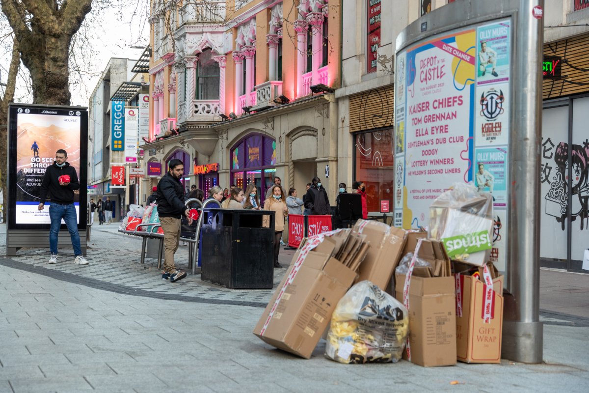 Advertising boards and signs on a UK high street. Credit: Glitch Images | Shutterstock